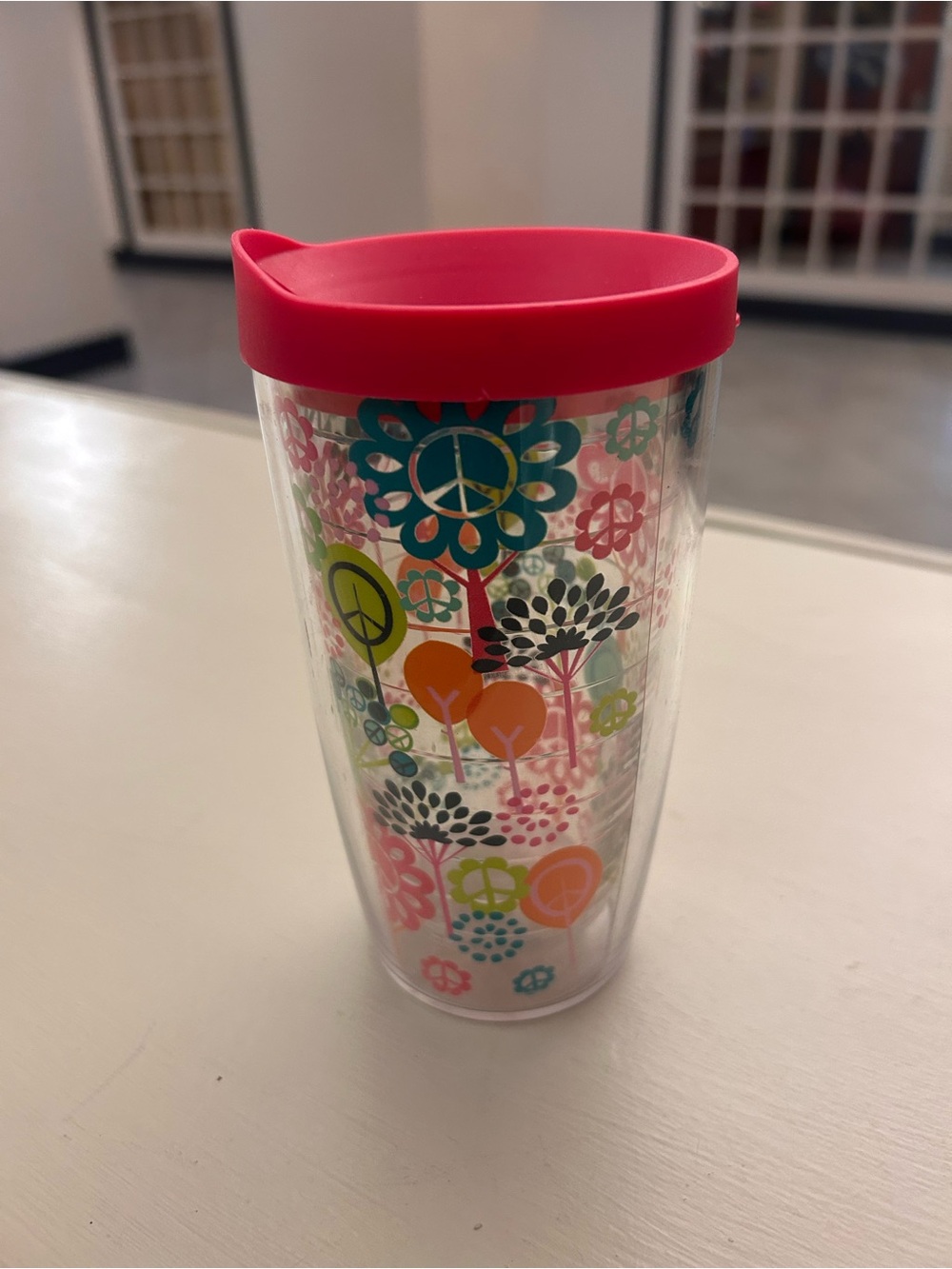 Retired Kids Travel Tumbler with Pink Lid and Colorful Peace Flower Print
